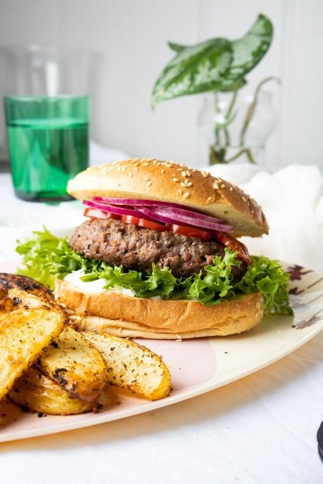 Hamburger with Feta Cheese Cream, Pickled Red Onion and Oven-baked Potatoes